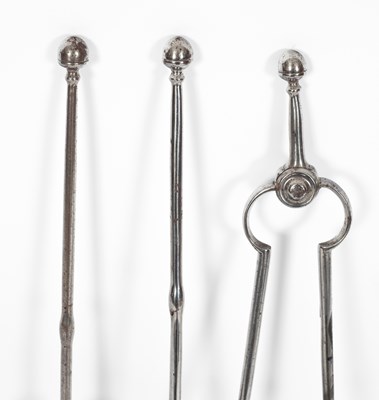 Lot 49 - A set of three burnished steel fire irons