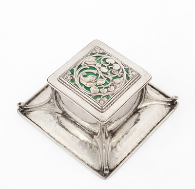 Lot An Arts & Crafts silver and green enamel inkstand