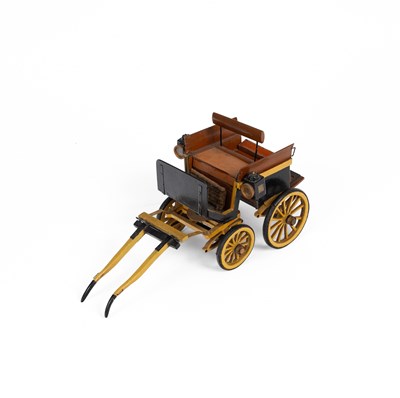 Lot 567 - A model wooden horse drawn carriage