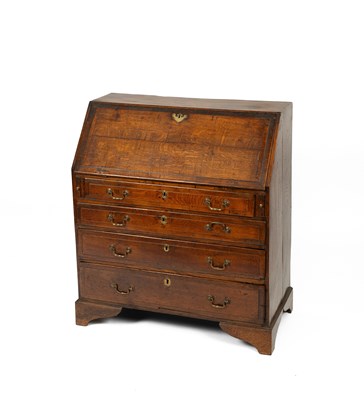 Lot 407 - A George III oak bureau