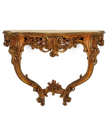 Lot 349 - A serpentine Rococo style carved giltwood console table