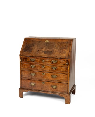 Lot 189 - A George II walnut and featherbanded bureau