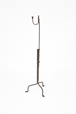 Lot 173 - An 18th Century iron floor standing rush light