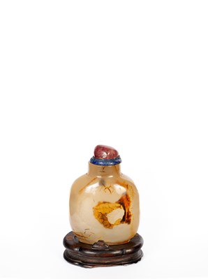 Lot 629 - A Chinese agate snuff bottle