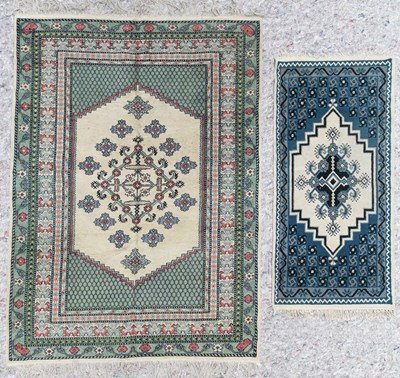 Lot 450 - A small Anatolian design carpet