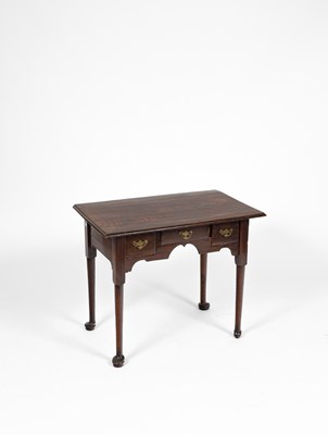 Lot 416 - A George III style lowboy