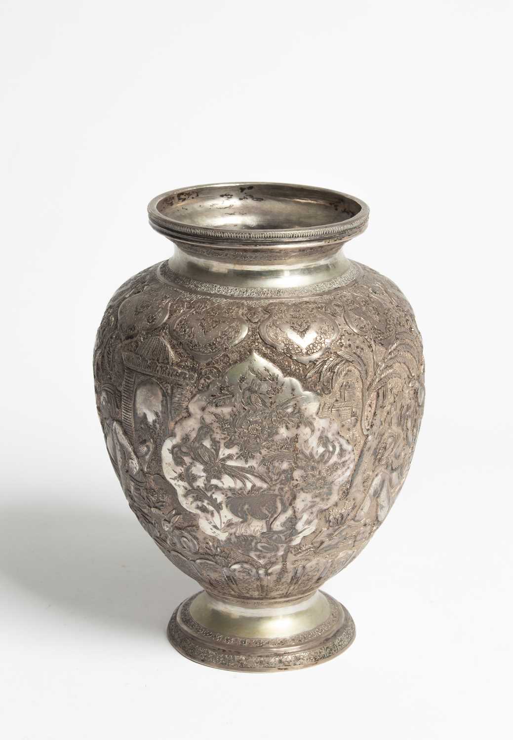 Lot 122 - A Persian white metal vase