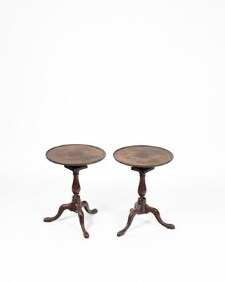 Lot 355 - A pair of mahogany tripod tables