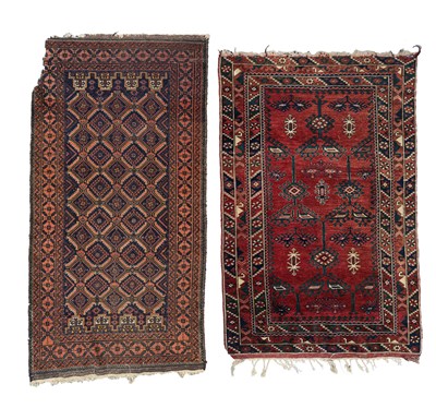 Lot 483 - A Dosemealti rug and a Belouch rug