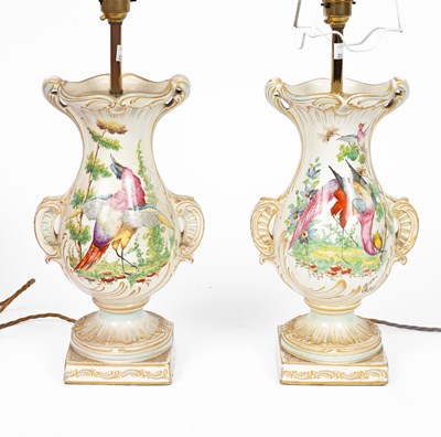 Lot 820 - A pair of earthenware lamps