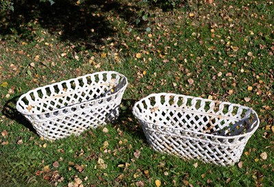 Lot 326 - A pair of white painted cast iron baskets