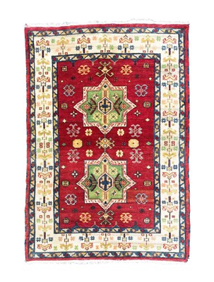 Lot 476 - A Kazak design rug