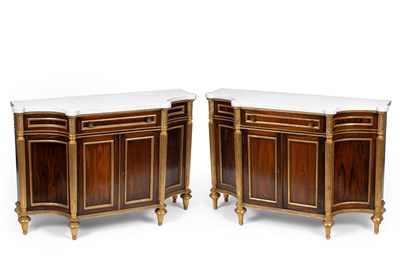 Lot 330 - A pair of Regency style rosewood and gilt side cabinets