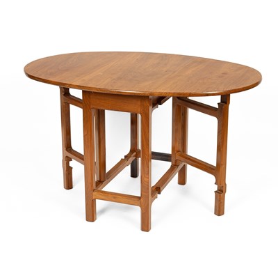 Lot 581 - Dennis French, a Cotswold Arts & Crafts walnut oval two flap gateleg table