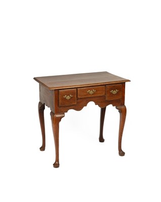 Lot 392 - A George III elm lowboy