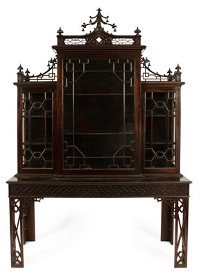 Lot 678 - A Chinese Chippendale style display cabinet on stand