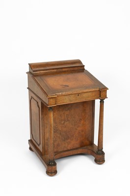 Lot 722 - A Victorian walnut and boxwood-strung Davenport desk