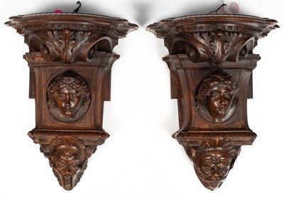 Lot 786 - A pair of wooden wall brackets