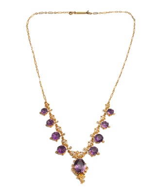 Lot 268 - An Edwardian yellow gold amethyst and seed pearl necklace