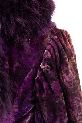 Lot 652 - A RSC purple velvet gown with purple feather boas to collar