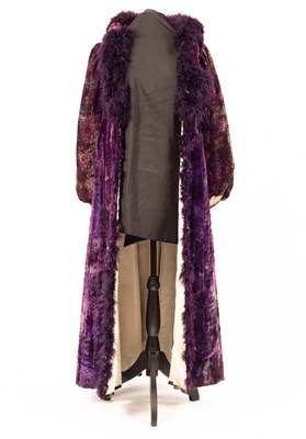 Lot 652 - A RSC purple velvet gown with purple feather boas to collar