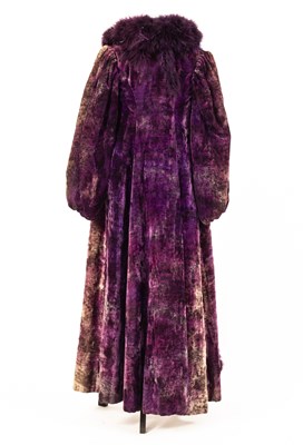 Lot 652 - A RSC purple velvet gown with purple feather boas to collar