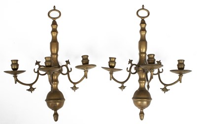 Lot 689 - A pair brass three-branch wall lights