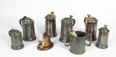 Lot 782 - Seven pewter and white metal tankards