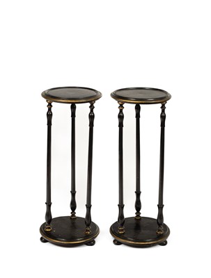 Lot 677 - A pair of 19th Century ebonised stands