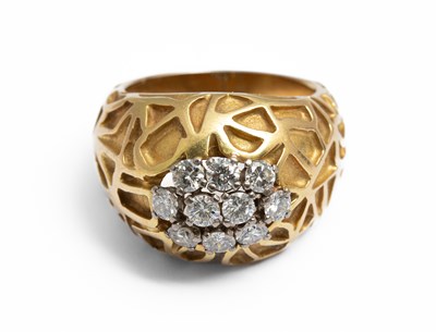 Lot 280 - Cartier, an 18ct yellow gold and diamond bombé dress ring