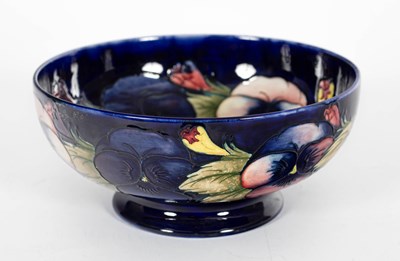 Lot 407 - A Moorcroft pansy pattern bowl