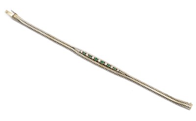 Lot 162 - A Continental white gold, emerald and diamond bracelet