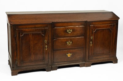 Lot 349 - An unusual George III oak dresser base