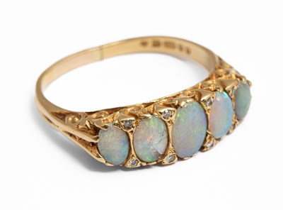 Lot 227 - An 18ct yellow gold and opal five stone ring