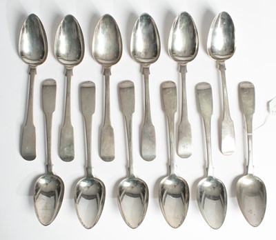 Lot 12 - A set of twelve George III silver serving spoons