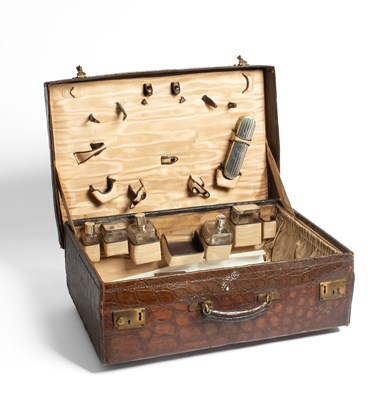 Lot 766 - A crocodile leather travelling case