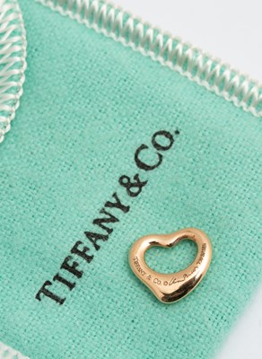 Lot 277 - Elsa Peretti for Tiffany & Co., an 18k yellow gold open heart pendant