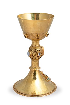 Lot 50 - An important Arts & Crafts 22ct gold and gem-set chalice and paten