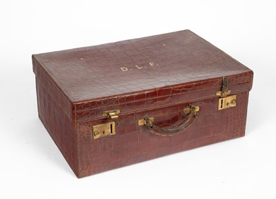 Lot 775 - A crocodile skin dressing case