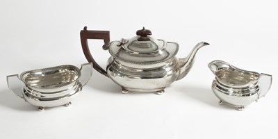 Lot 48 - A silver three piece tea set