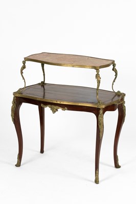 Lot 733 - A French gilt metal and marble topped two-tier étagère