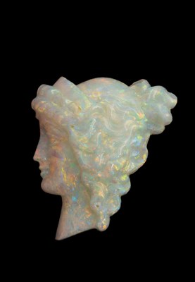 Lot 241 - A loose carved opal