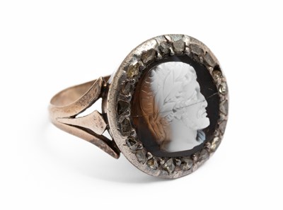 Lot 250 - A 19th century yellow metal sardonyx and diamond cameo ring