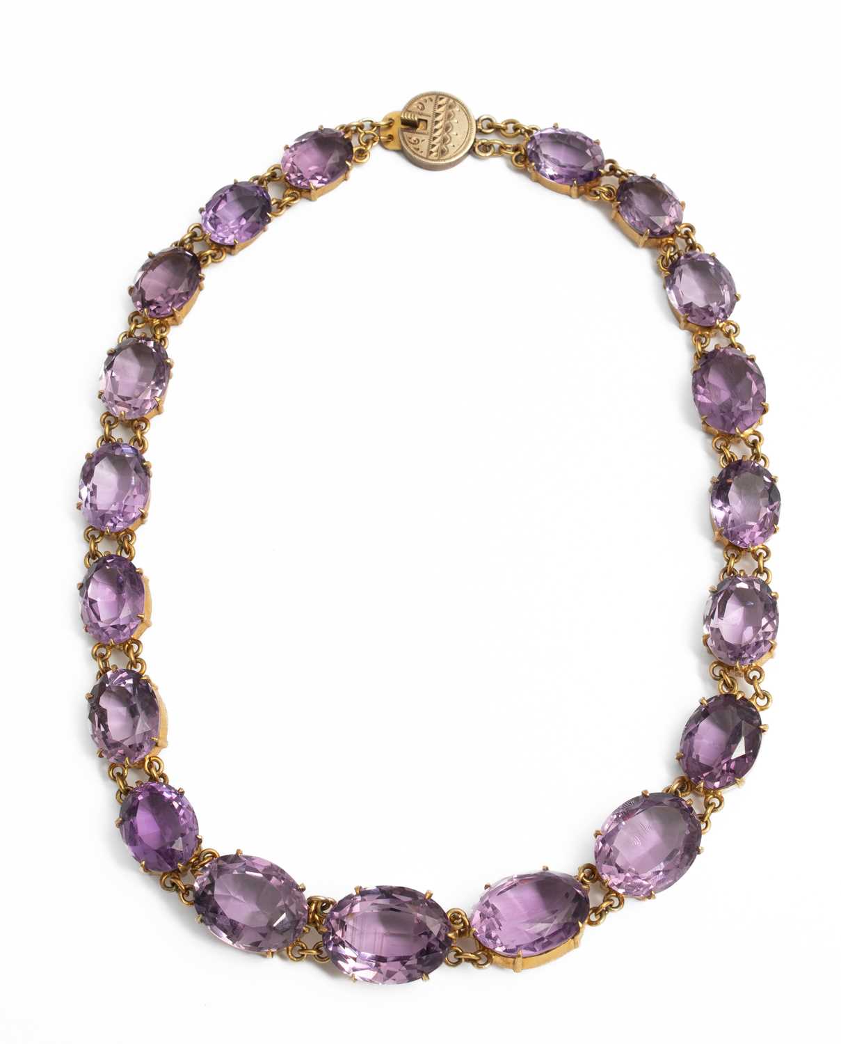 Lot 252 - A 19th century yellow metal and amethyst