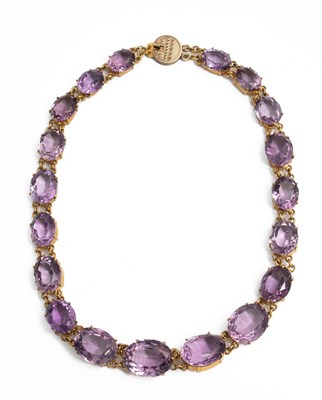 Lot 252 - A 19th century yellow metal and amethyst Riviere necklace