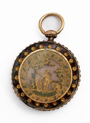 Lot 254 - A 19th Century yellow metal circular locket