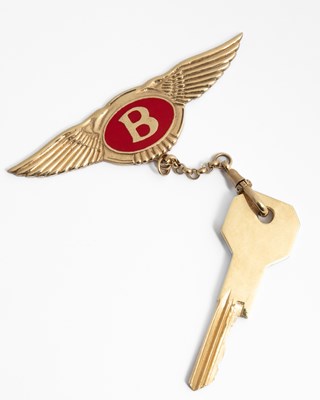 Lot 333 - A 9ct gold and enamel Bentley key fob