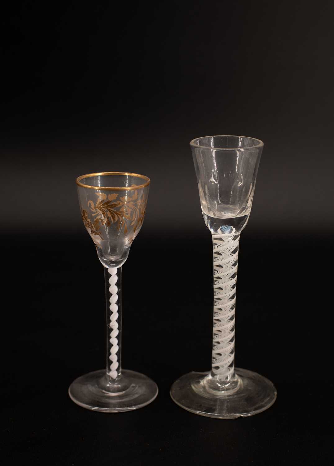 Lot 116 - Two 18th Century cotton twist wine glasses
