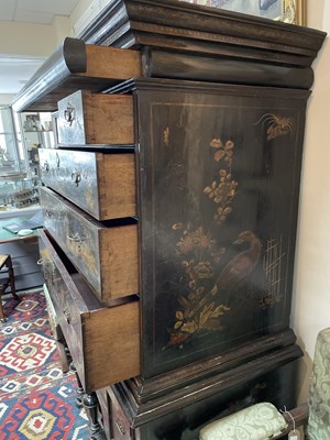 Lot 299 - An 18th Century and later black lacquer and gilt chinoiserie decorated chest on stand