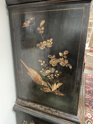 Lot 299 - An 18th Century and later black lacquer and gilt chinoiserie decorated chest on stand